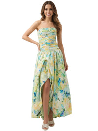 Thumbnail for Woman wearing a green-blue floral strapless long bubble dress on a white background