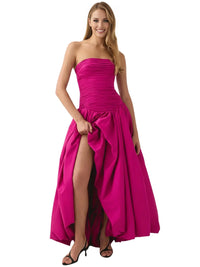 Thumbnail for Woman wearing a deep pink strapless long bubble dress with a high slit on a white background