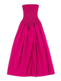 Thumbnail for Woman wearing a deep pink strapless long bubble dress with a high slit on a white background