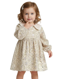 Thumbnail for Young girl wearing a vintage floral dress with a white doll collar on a white background