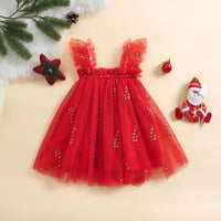Thumbnail for Red festive dress with gold details on a beige background with Christmas decorations.