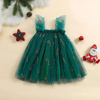 Thumbnail for Green tulle dress with candy cane pattern on a beige background with Christmas decorations.