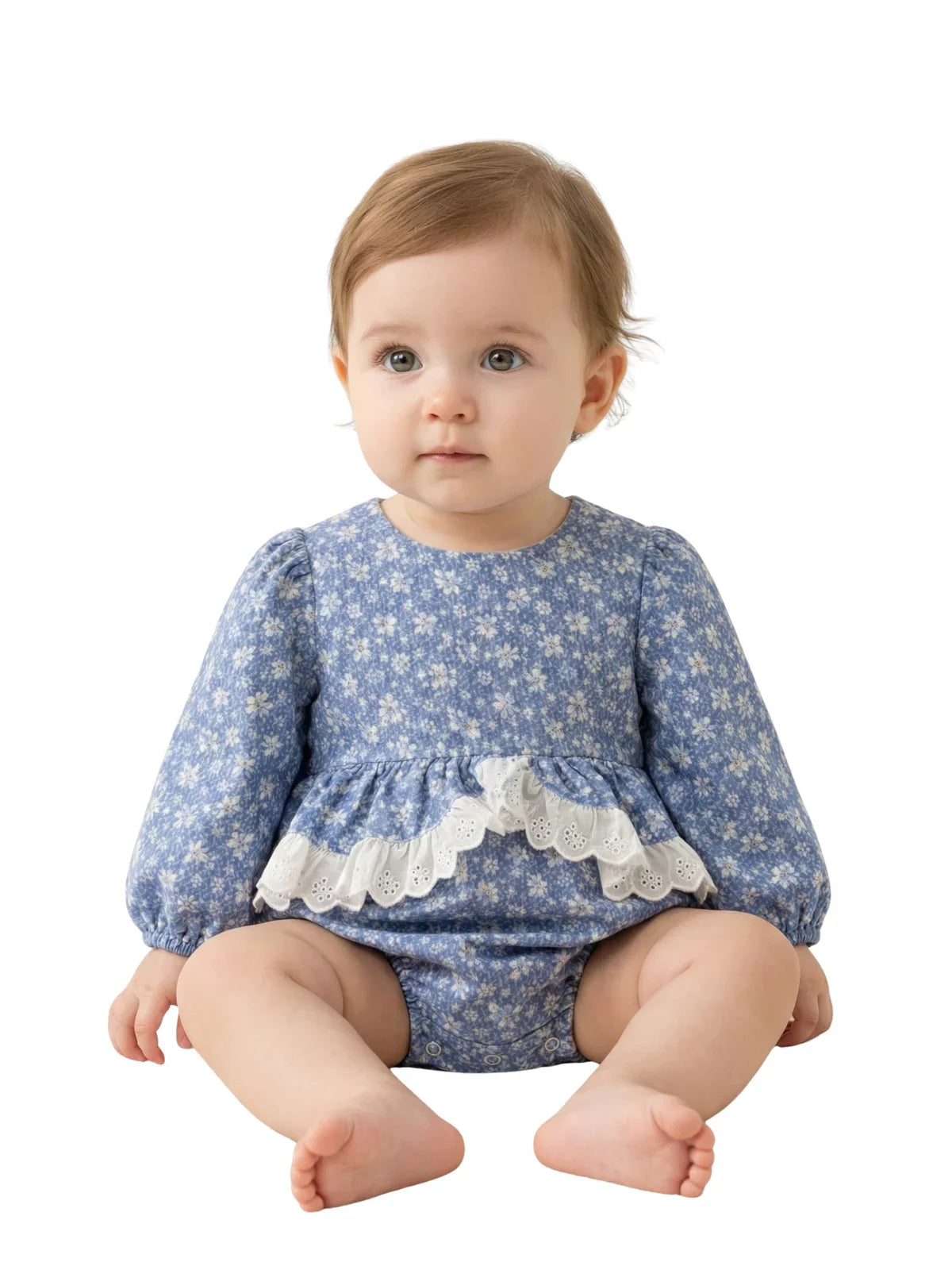 Baby wearing a blue floral romper with lace details on a white background