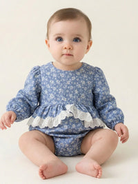 Thumbnail for Baby wearing a blue floral romper with lace trim on a white background