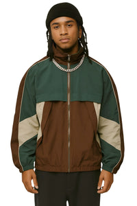 Thumbnail for Man wearing a green and brown jacket with a white background