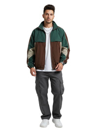Thumbnail for Man wearing a green and brown jacket with gray pants on a white background