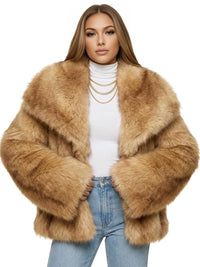 Thumbnail for Woman wearing a camel colored faux fur coat over a white turtleneck and blue jeans on a white background