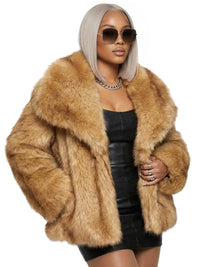 Thumbnail for Woman wearing a camel colored faux fur coat and sunglasses on a white background