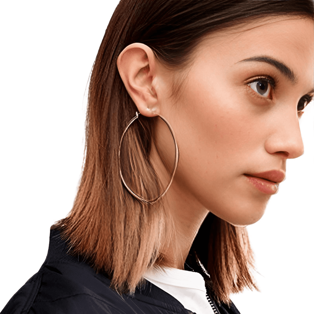 Make a bold fashion statement with these Women's Big Silver Hoop Earrings! Choose from 4 different sizes to suit your style. Shop at Drestiny today and enjoy free shipping, plus we'll take care of the tax! Don't miss out on savings of up to 50% off!