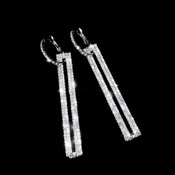 Complete your look with Women's Long White Faux Diamond Drop Earrings at Drestiny. Benefit from free shipping and tax coverage! Save up to 50% today!