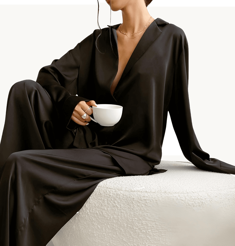 Upgrade your sleepwear with the Women's Low Cut Wide Leg Black Pajama Set. Shop Drestiny for free shipping and tax covered. Save up to 50%!