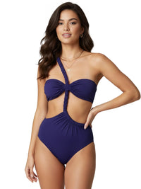 Thumbnail for Woman wearing a navy blue bikini on a white background