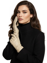 Thumbnail for Woman wearing a black turtleneck and beige leather gloves on a white background