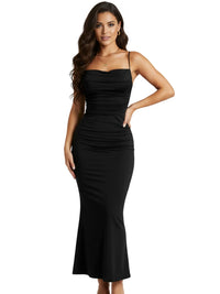 Thumbnail for Woman wearing a black dress on a white background