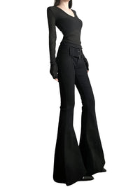Thumbnail for Black outfit with long-sleeve top and black flared pants on a white background
