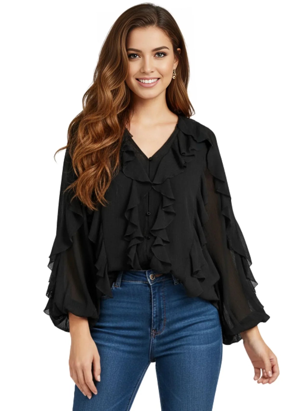 Woman wearing a black ruffled blouse and blue jeans on a white background
