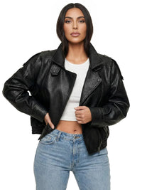 Thumbnail for Woman wearing a black leather jacket and blue jeans on a white background