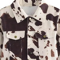 Thumbnail for Cow print jacket with brown and white pattern on a plain background
