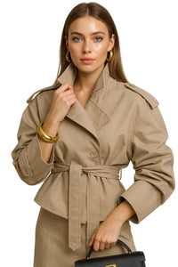 Thumbnail for Woman wearing a beige cropped trench coat on a white background