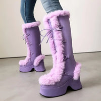 Thumbnail for Purple platform boots with fluffy fur trim worn by a person.
