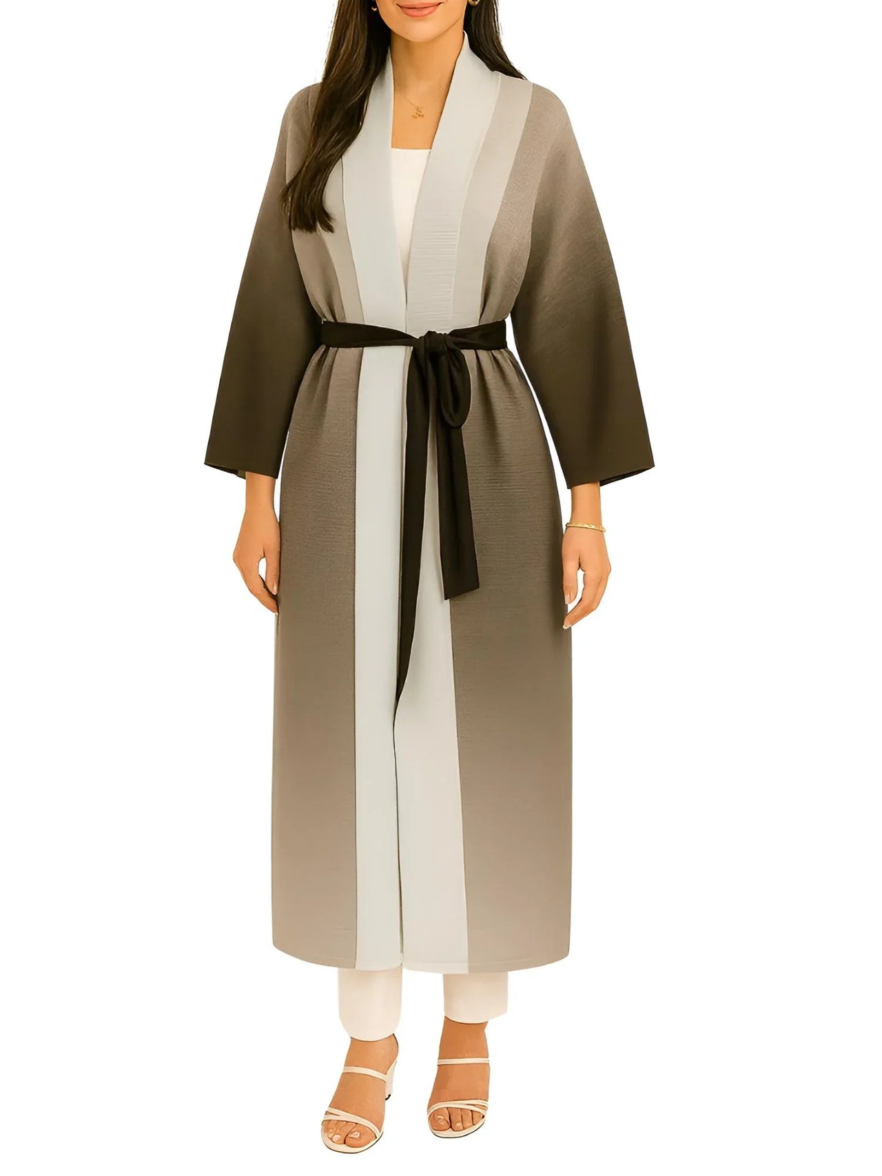 Woman wearing a long, two-tone dark gray coat with a belt on a white background