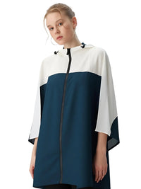Thumbnail for Woman wearing a white and navy blue raincoat on a white background