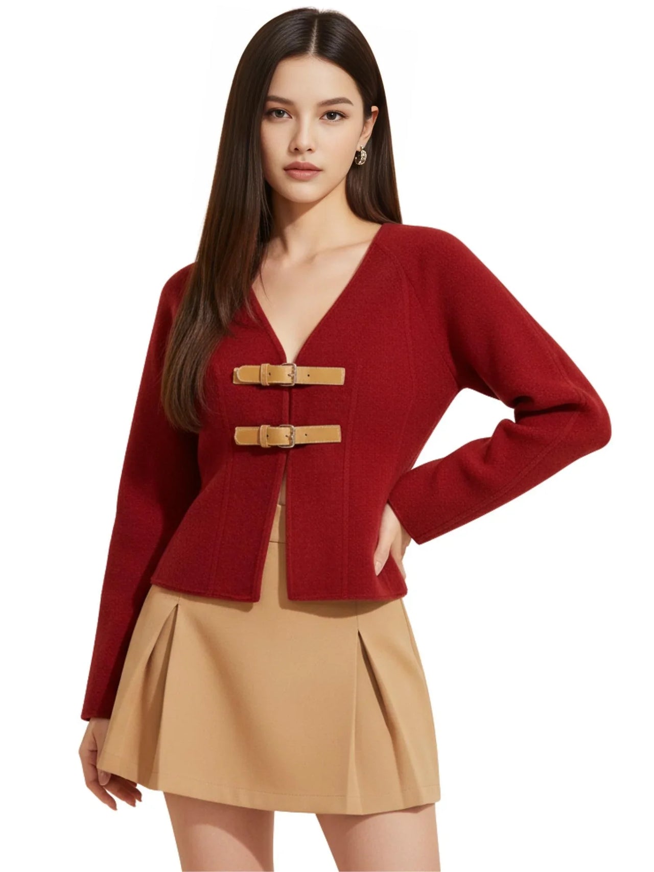 Woman wearing a red jacket with a brown buckle and beige skirt on a white background