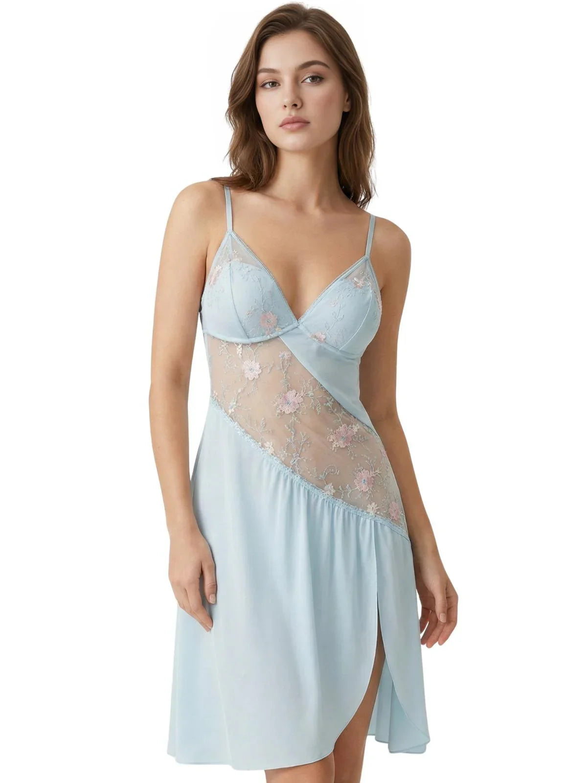 Woman wearing a short light blue nightgown with sheer floral lace inlay on a white background