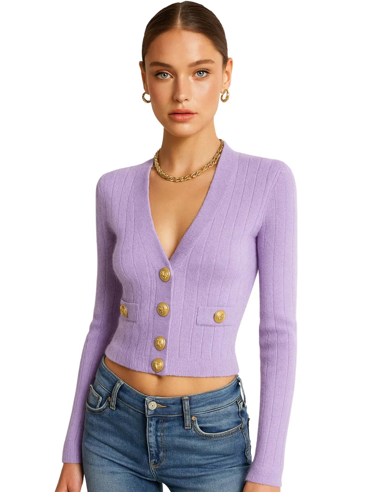 Woman wearing a purple cardigan with gold buttons on a white background
