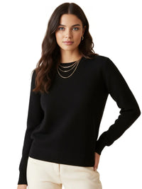 Thumbnail for Woman wearing a black sweater and white pants on a white background