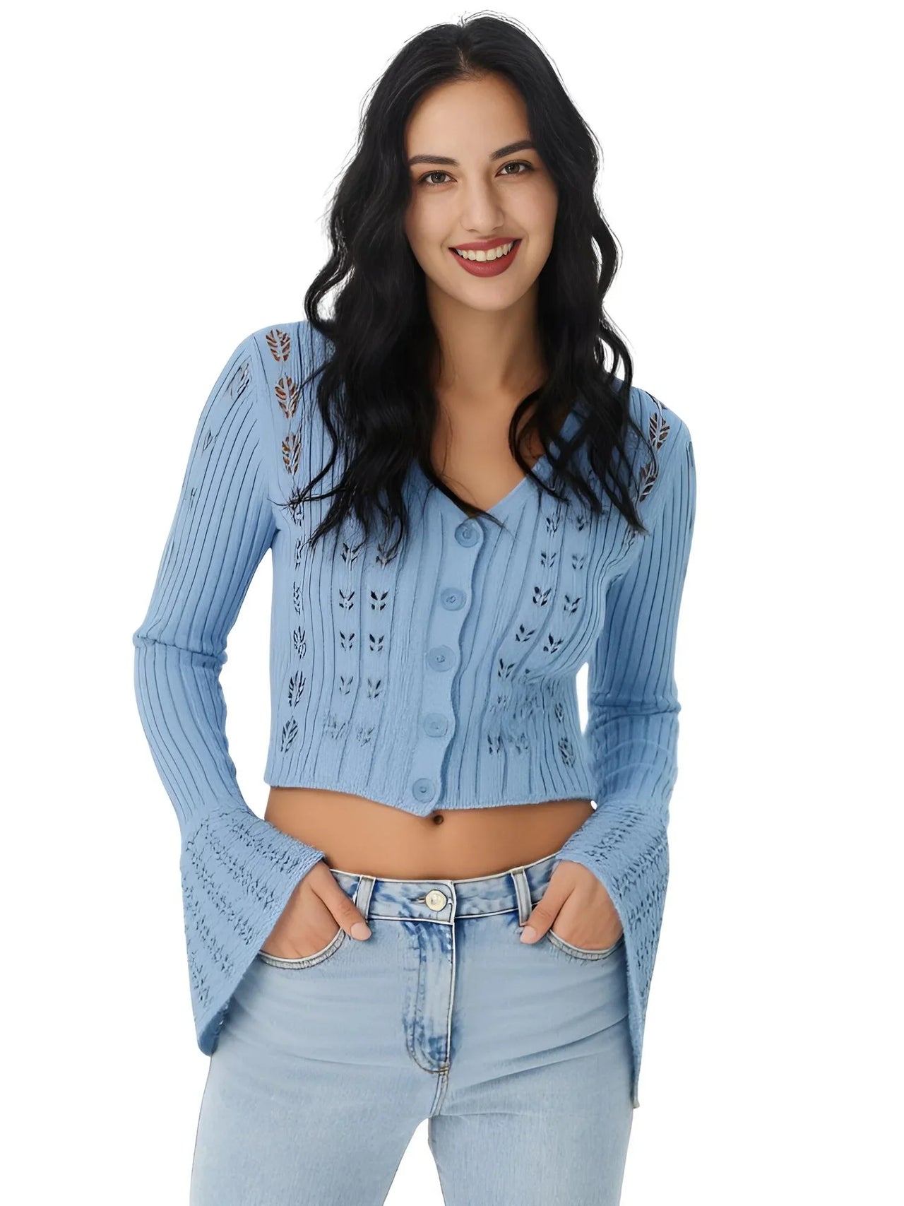 Woman wearing a blue knit cardigan and jeans on a white background