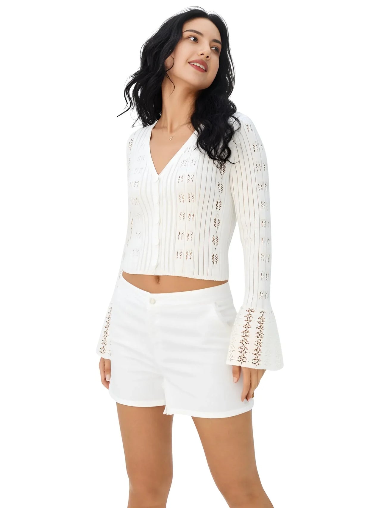 Woman wearing a white sweater and shorts with decorative elements on a white background