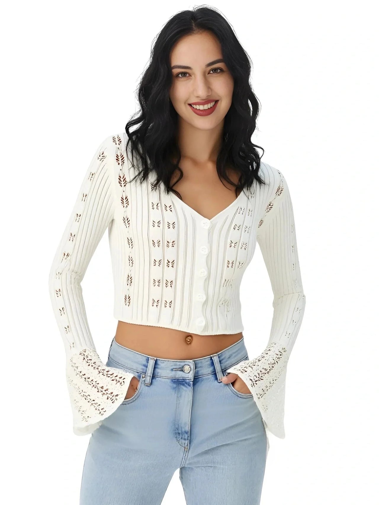 Woman wearing a white flare sleeve top and light blue jeans on a white background