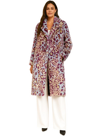 Thumbnail for Woman wearing a leopard print coat on a white background