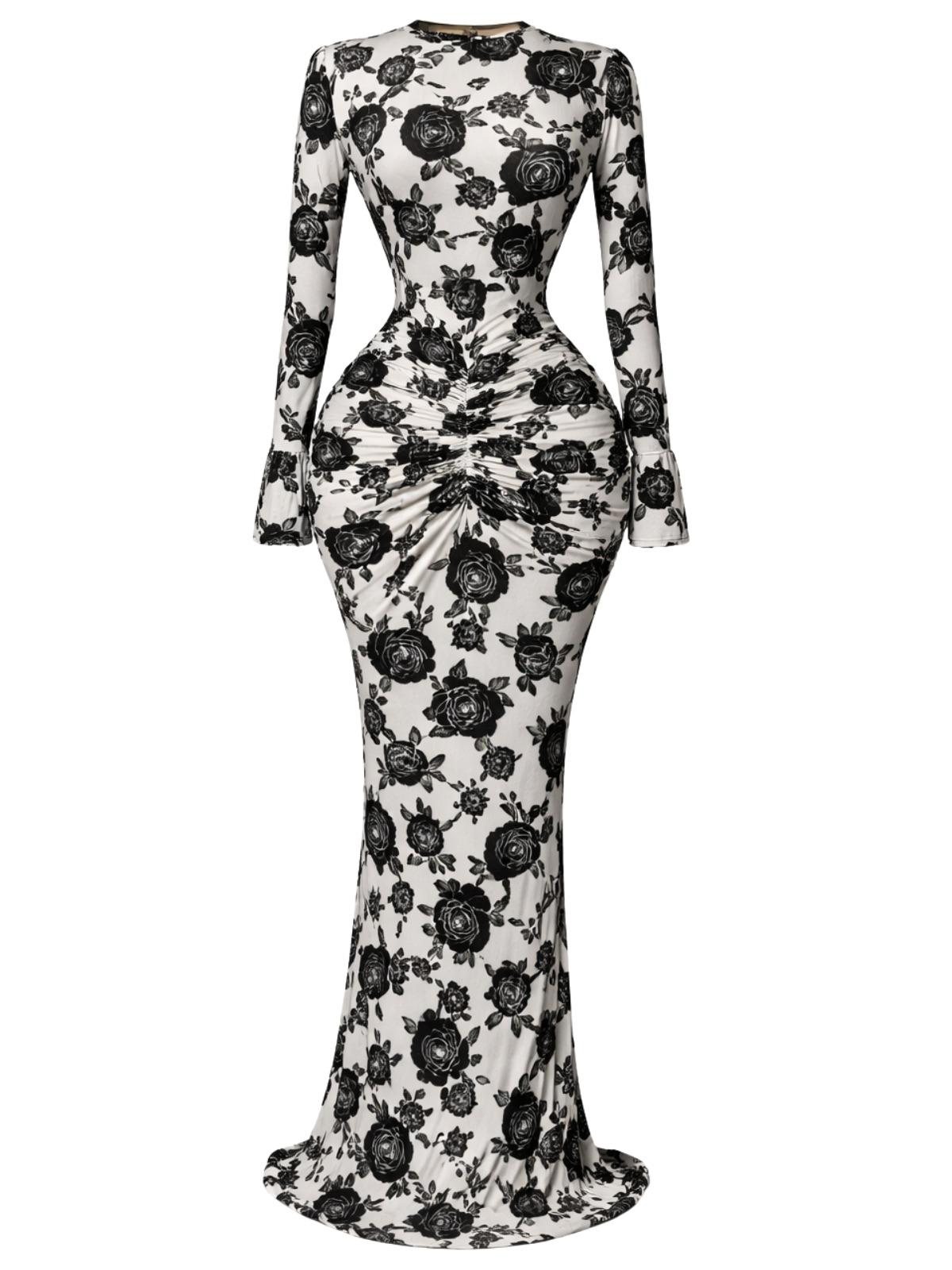 Black floral patterned dress on a white background