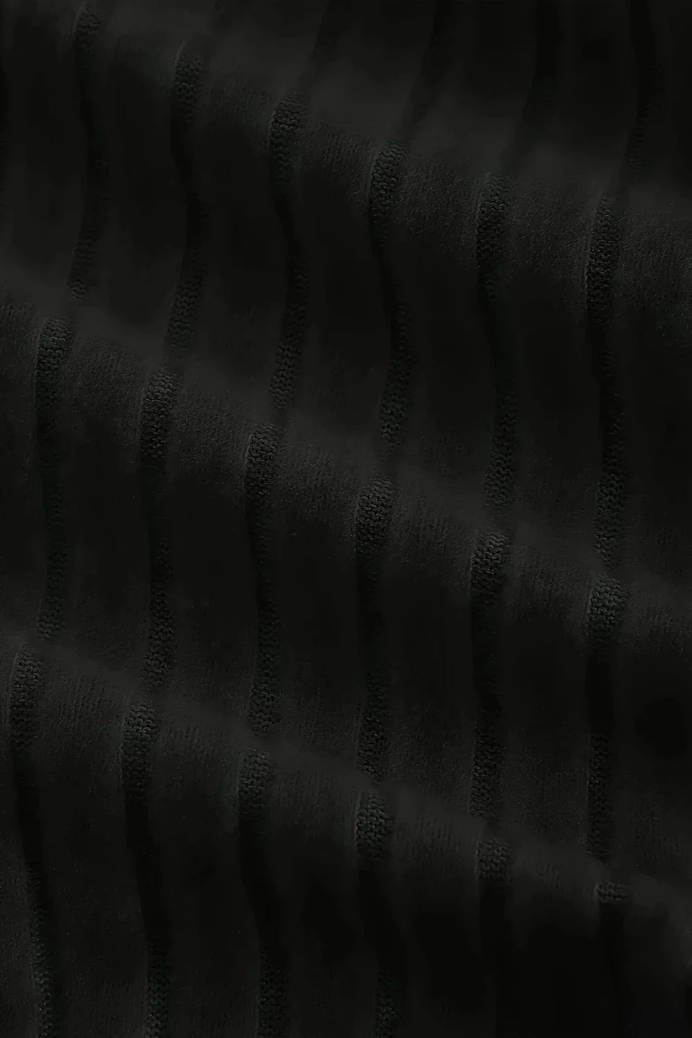 Black textured material pattern