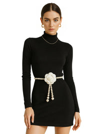 Thumbnail for Black dress with a pearl waist belt featuring a camellia flower on a white background