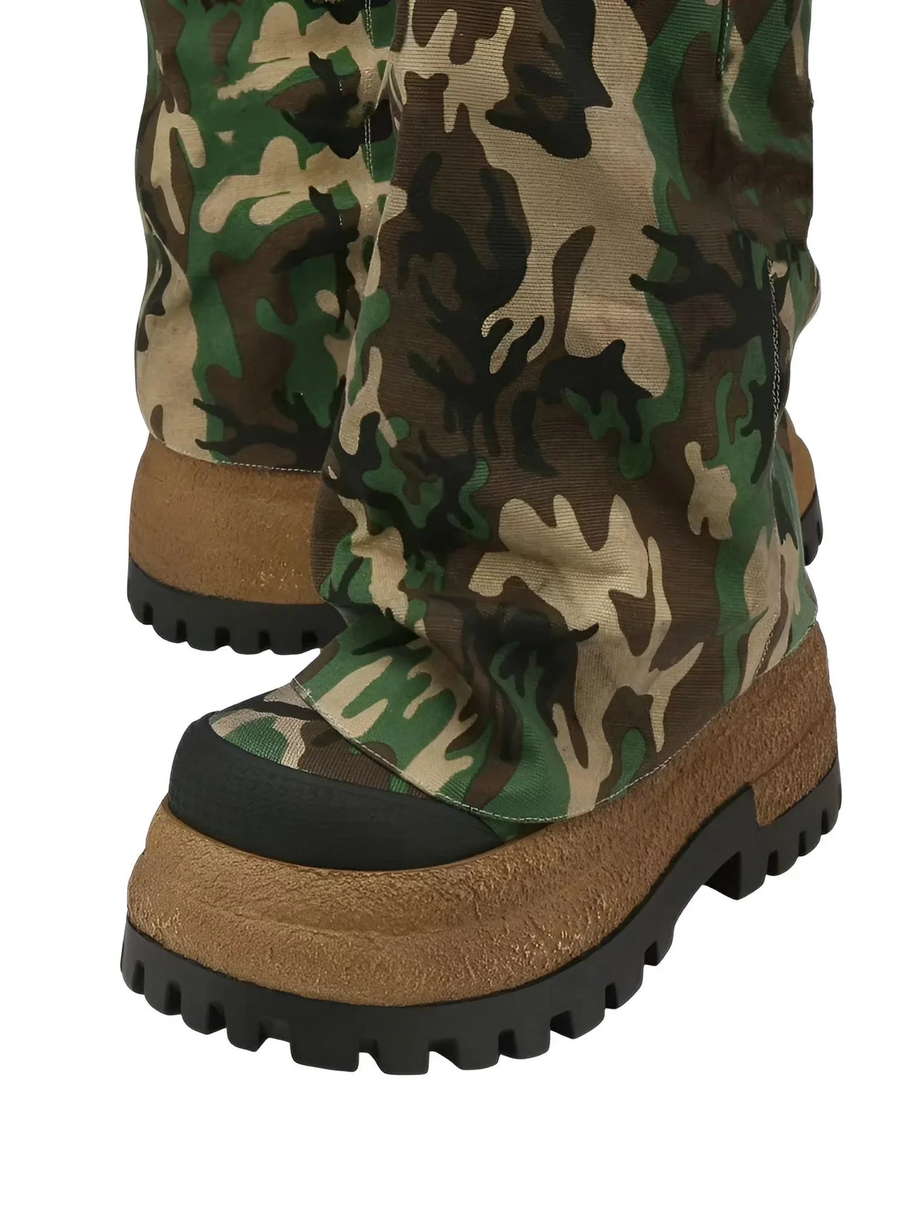 Camouflage boot with brown sole on a white background