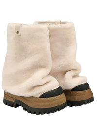 Thumbnail for Pair of milk white platform boots with black soles on a white background