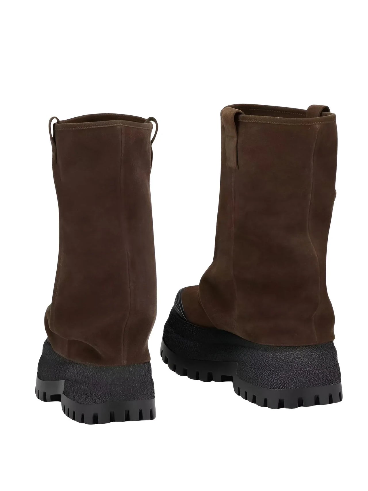 Pair of brown suede boots with black soles on a white background