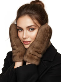 Thumbnail for Woman wearing real mink brown fur gloves on a white background