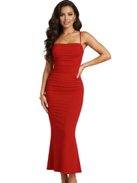 Thumbnail for Woman wearing a red dress on a white background