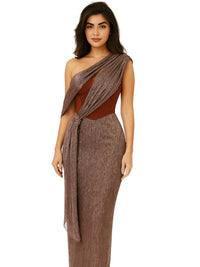 Thumbnail for Woman wearing a brown one-shoulder dress with a draped effect on a white background