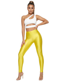 Thumbnail for Woman wearing a white top and yellow leggings on a white background