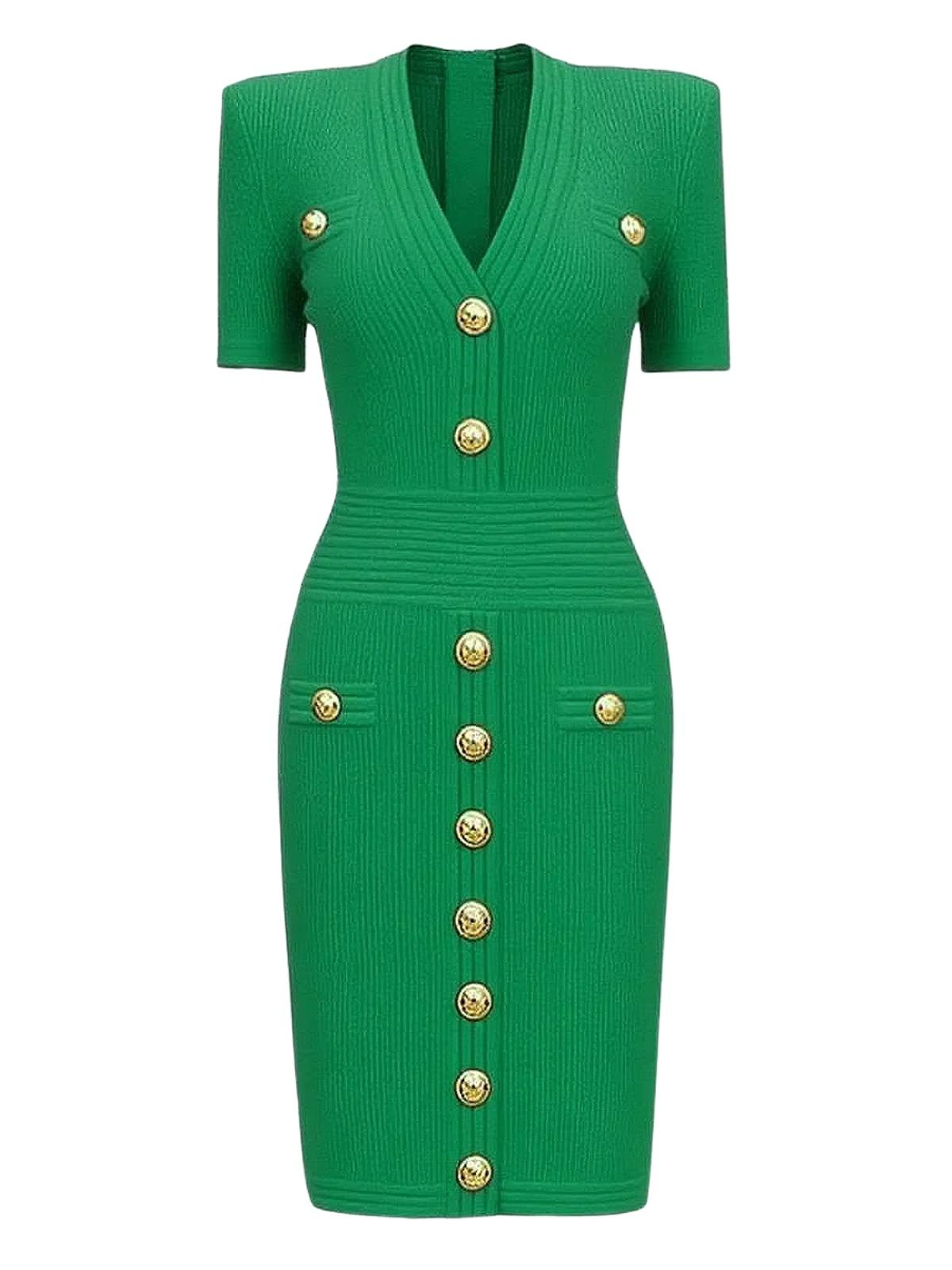 Green dress with gold buttons on a white background