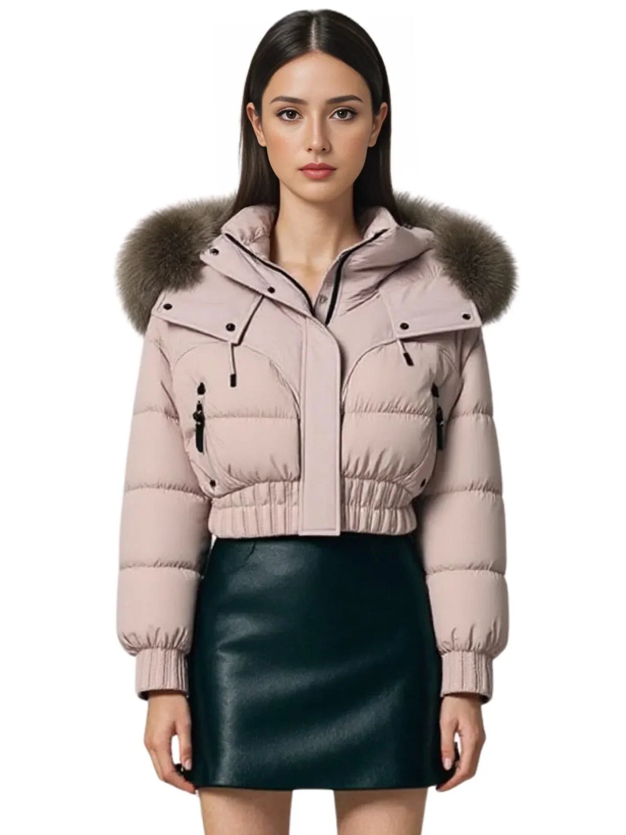 Woman wearing a pink puffer jacket with a large fur hood on a white background