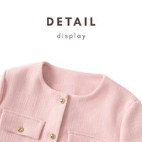 Thumbnail for Close-up of a pink jacket with gold buttons on a white background