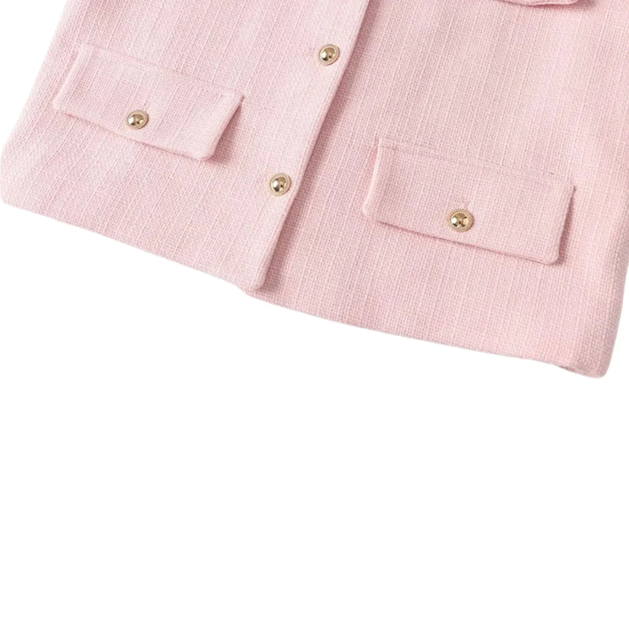 Close-up of a pink jacket with gold button details on a white background