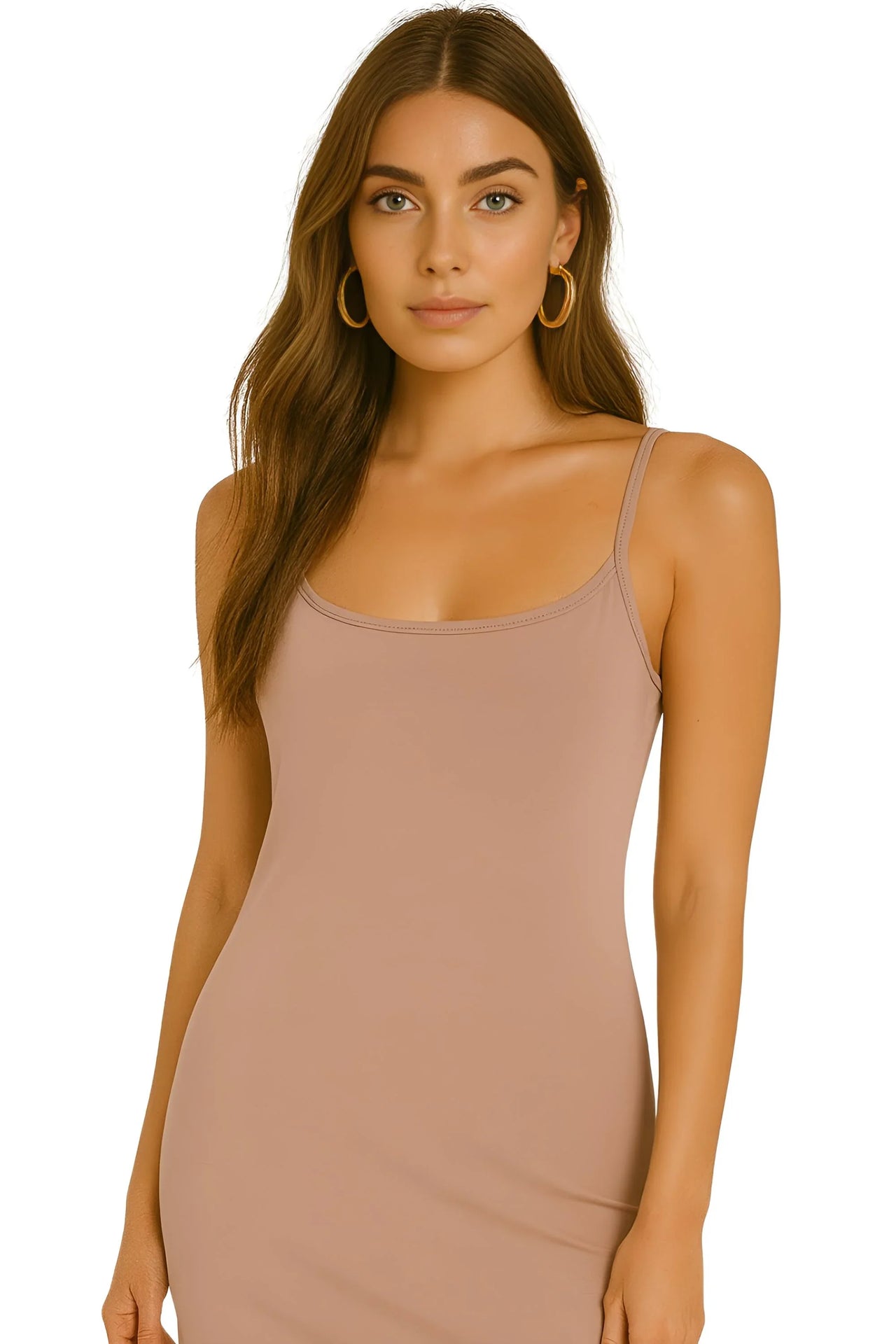 Woman wearing a pink khaki slip dress against a white background
