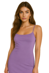 Thumbnail for Woman wearing a blue purple slip dress against a white background